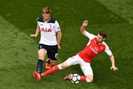 LONDON, ENGLAND - APRIL 30: Eric Dier of Tottenham Hotspur is tackled by Aaron Ramsey of Arsenal during the Premier League match between Tottenham Hotspur and Arsenal at White Hart Lane on April 30, 2017 in London, England.  (Photo by Dan Mullan/Getty Images)